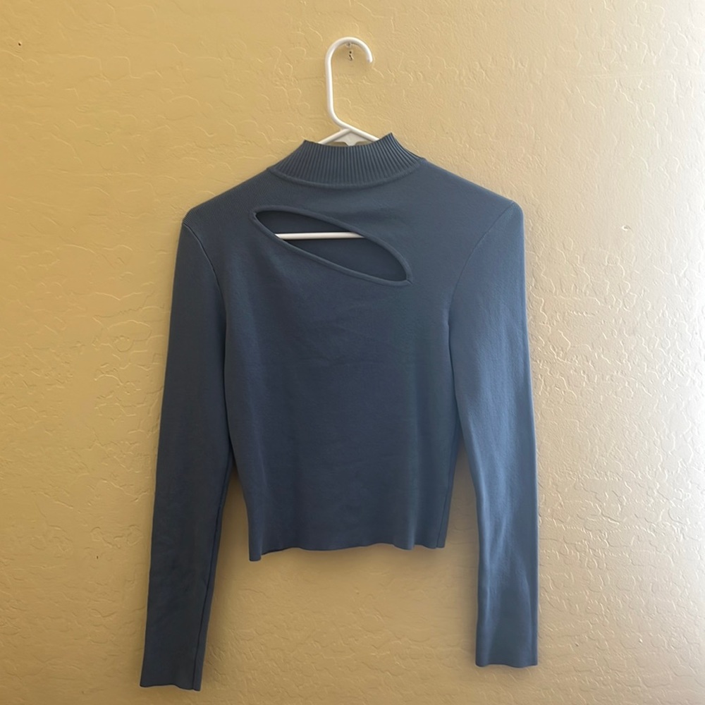 Blue long sleeve ,neck cut out , low turtle neck , large but looks medium